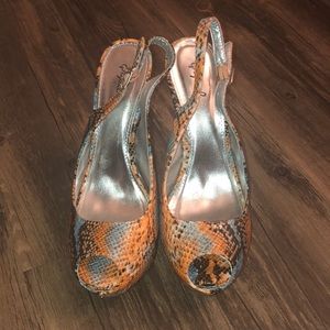 Women’s turquoise/orange snake heels